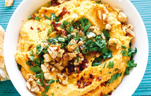 Vegan cashew-topped sweet potato hummus