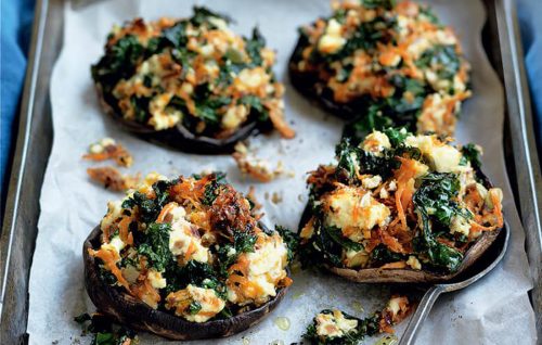 Mushrooms stuffed with kale, ricotta and seeds