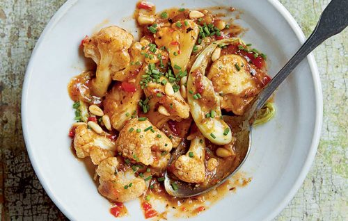 Wok-fried cauliflower with honey soy hoisin and pine nuts
