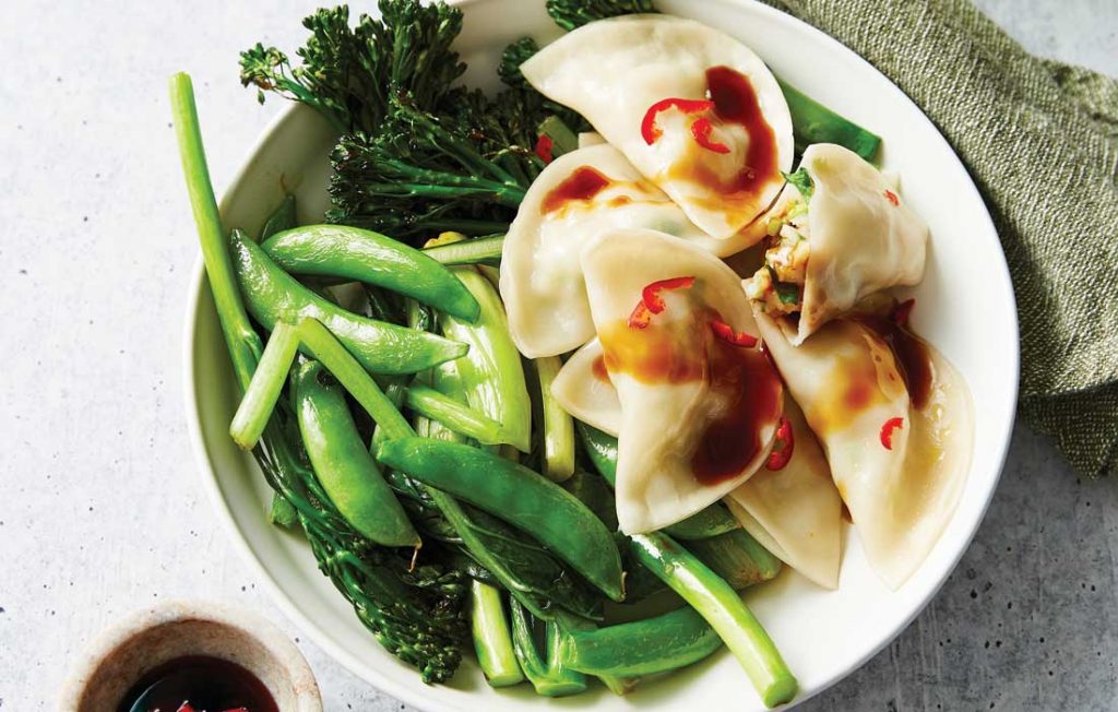 Prawn and ginger dumplings with Asian greens Prawn and ginger dumplings with Asian greens