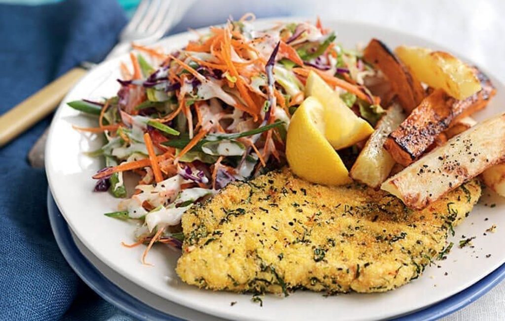 Herb-crumbed chicken with baked potato chips Herb-crumbed chicken with baked potato chips