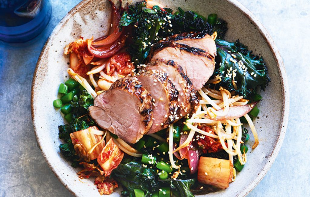 Roasted pork with warm kimchi and kale salad Roasted pork with warm kimchi and kale salad