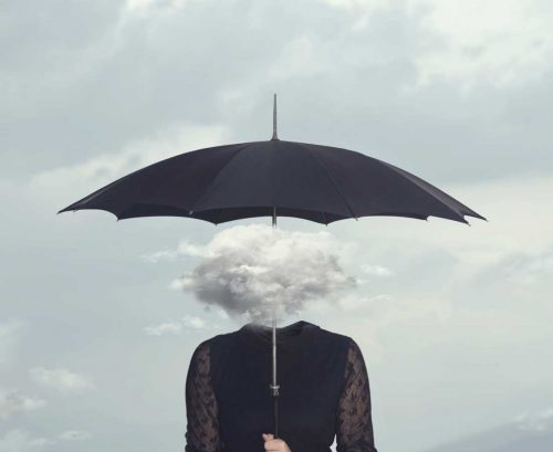 Woman with cloud for a head holding an umbrella