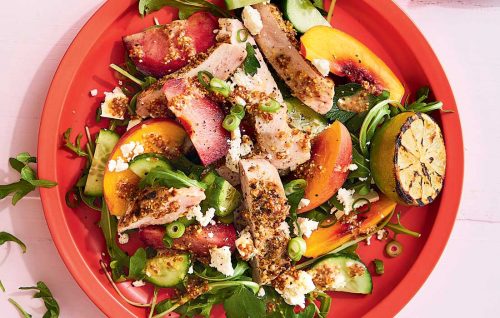 Pistachio dukkah pork with peach and plum salad