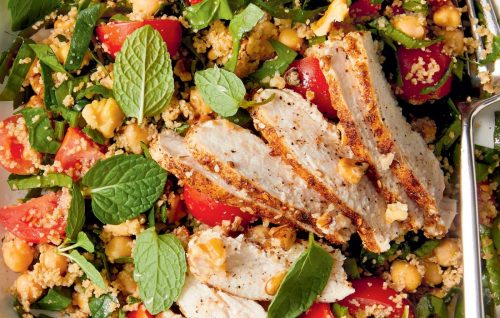 Spice-crusted chicken on chickpea and walnut salad