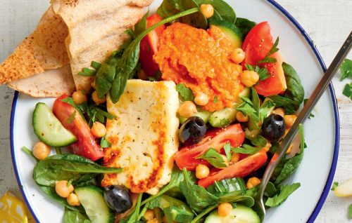 Greek mezze bowl with chickpeas and haloumi