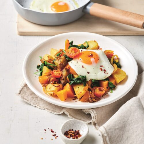 Indian-spiced bubble and squeak with fried eggs