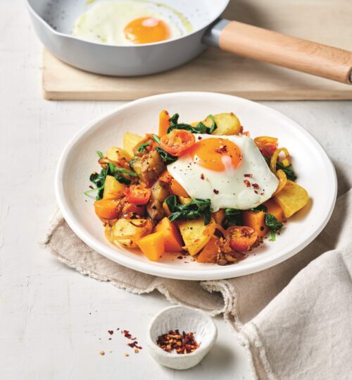 Indian-spiced bubble and squeak with fried eggs