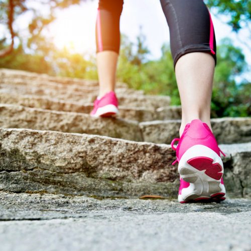 Woman walking up steps