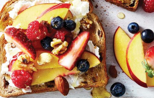 Raisin toast with ricotta, fruit and seeds