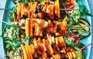 Sweet potato and haloumi skewers with couscous salad