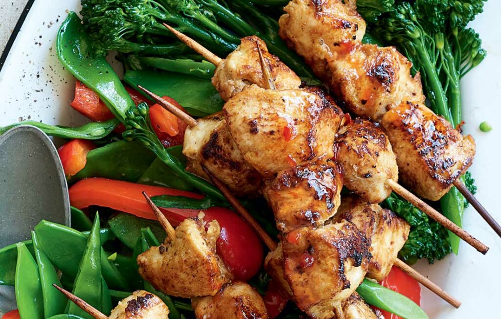 Sticky chicken skewers with stir-fried greens Sticky chicken skewers with stir-fried greens