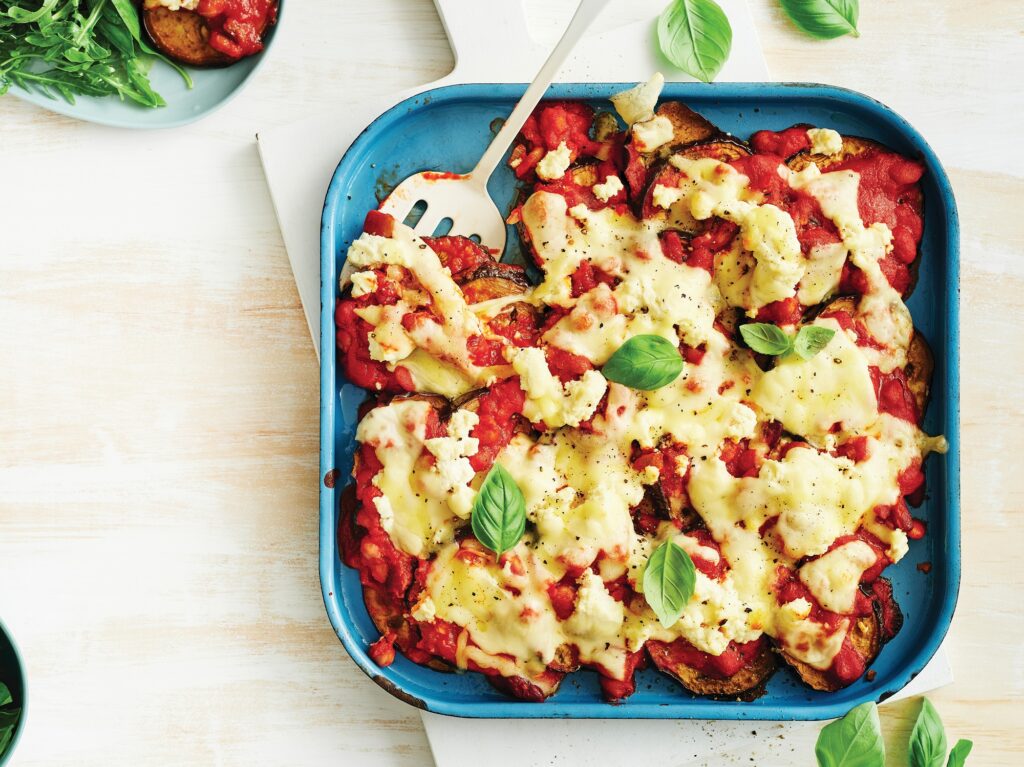 Eggplant parmigiana with basil leaf salad