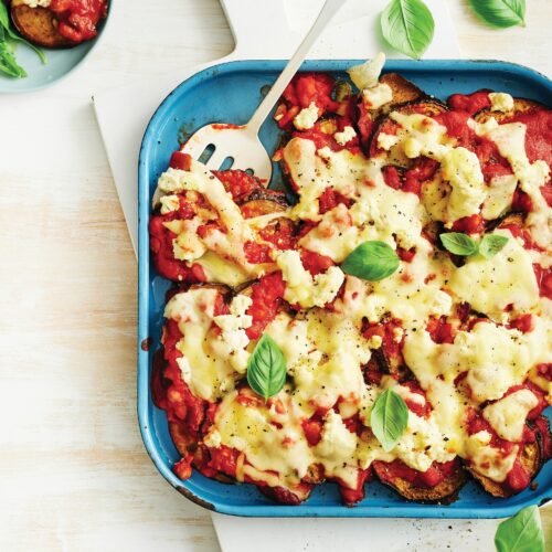 Eggplant parmigiana with basil leaf salad