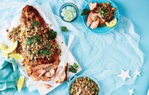 Baked harissa salmon with warm lentil salad