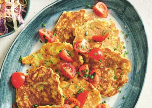 Corn and zucchini fritters with tomatoes