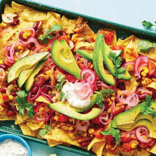 Vegetarian nachos with jalapeño sour cream