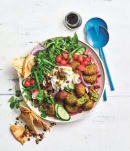 Falafel salad with beetroot hummus and tzatziki