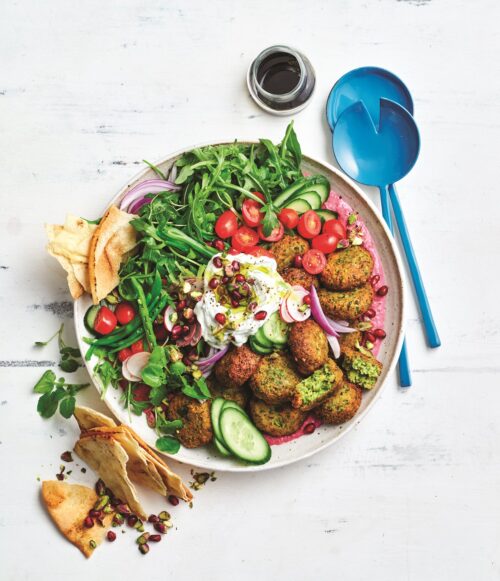 Falafel salad with beetroot hummus and tzatziki