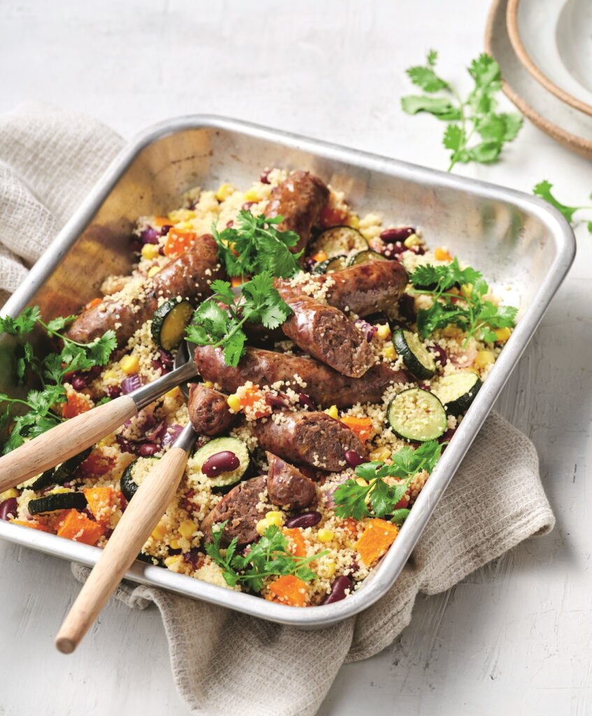 Vegie and couscous sausage traybake