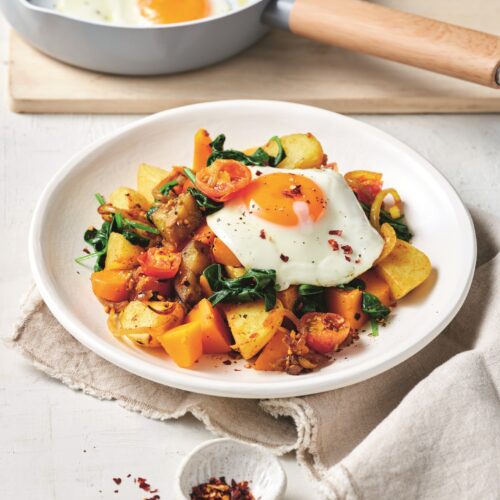 Indian-spiced bubble and squeak with fried eggs