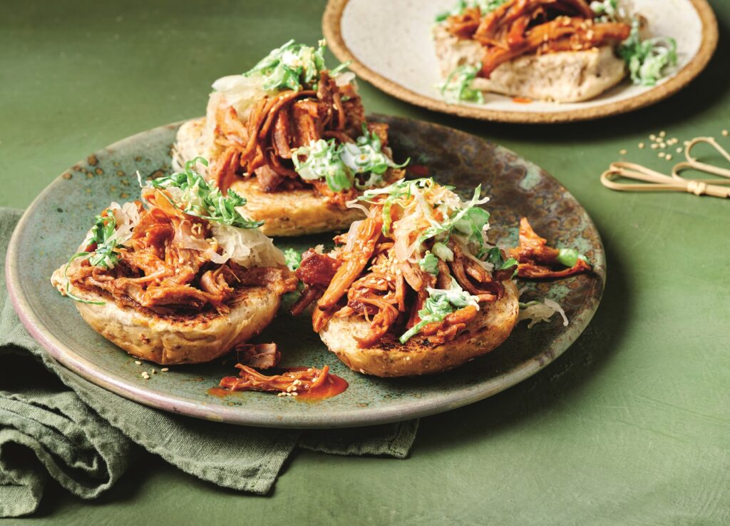 Pulled pork buns with broccoli slaw and sauerkraut Pulled pork buns with sauerkraut
