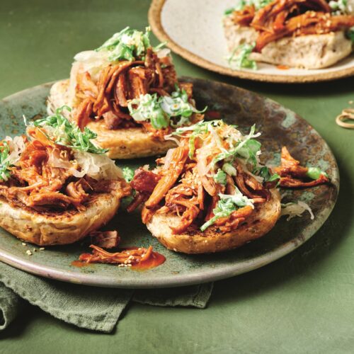 Pulled pork buns with broccoli slaw and sauerkraut