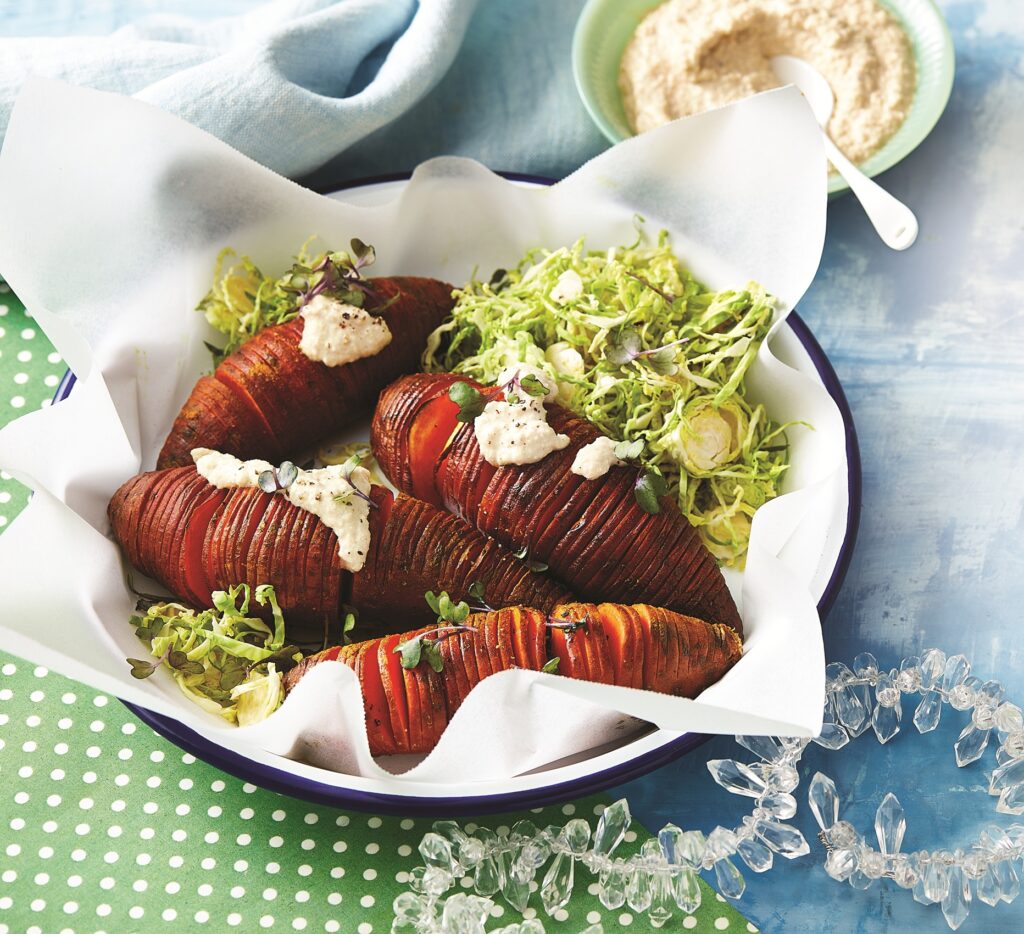 Hasselback sweet potatoes with vegan cheese sauce