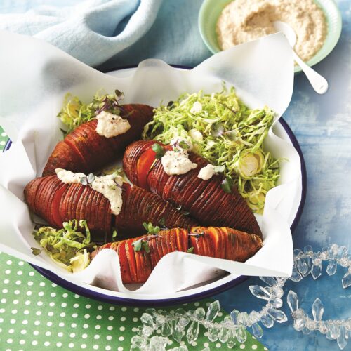 Hasselback sweet potatoes with vegan cheese sauce